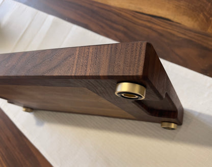 Unique endgrain walnut and white oak cutting board with elegant metal golden feet.